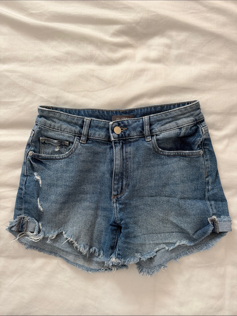 DL1961 Women’s Light Blue Distressed Denim Shorts